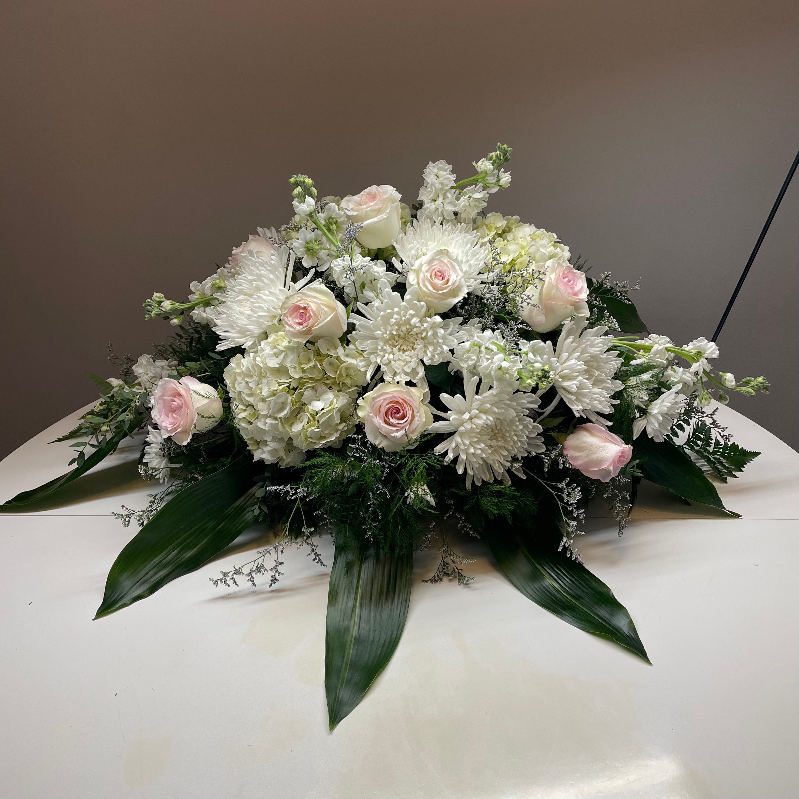 Bouquet Casket Spray: roses and orchids