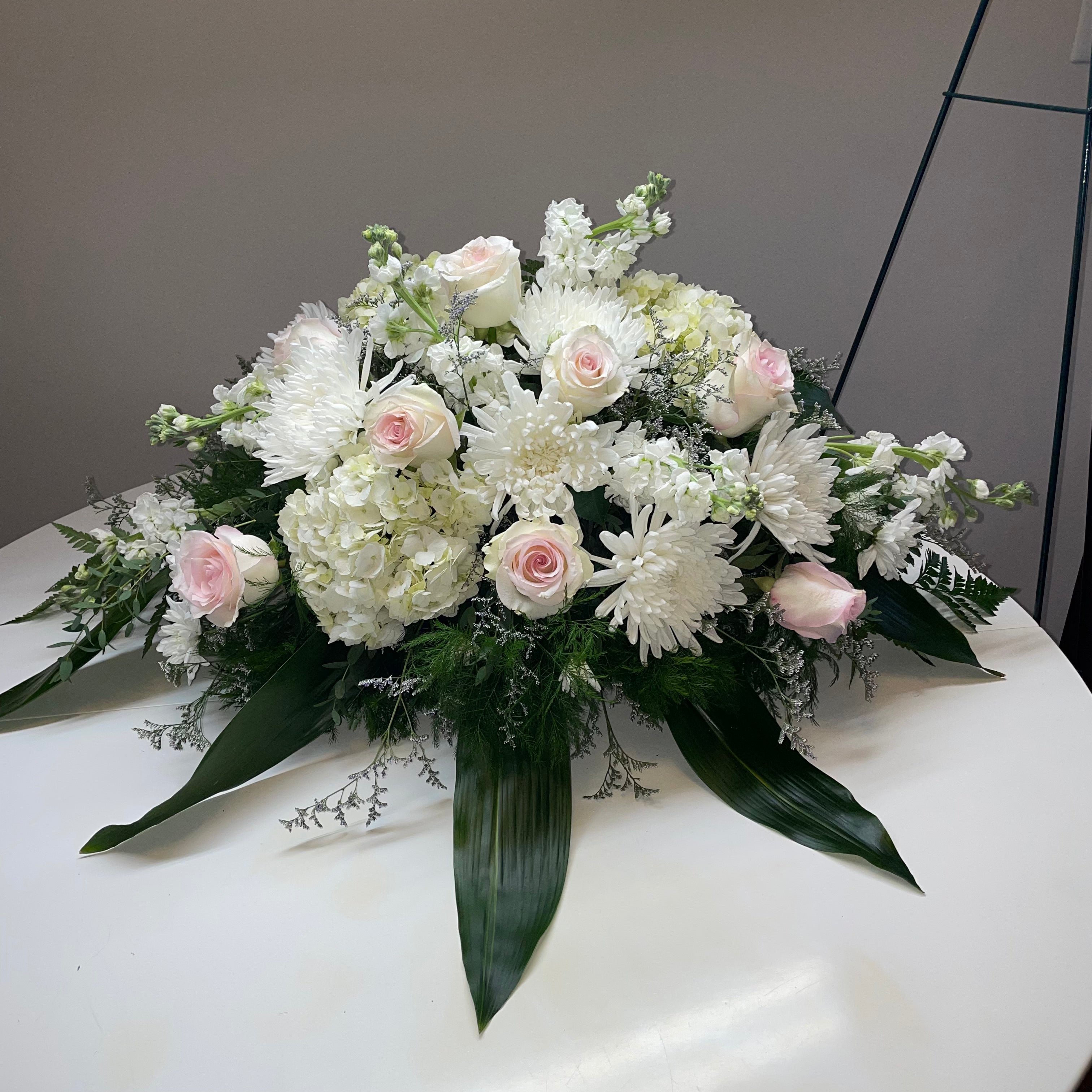 Bouquet Casket Spray: roses and orchids