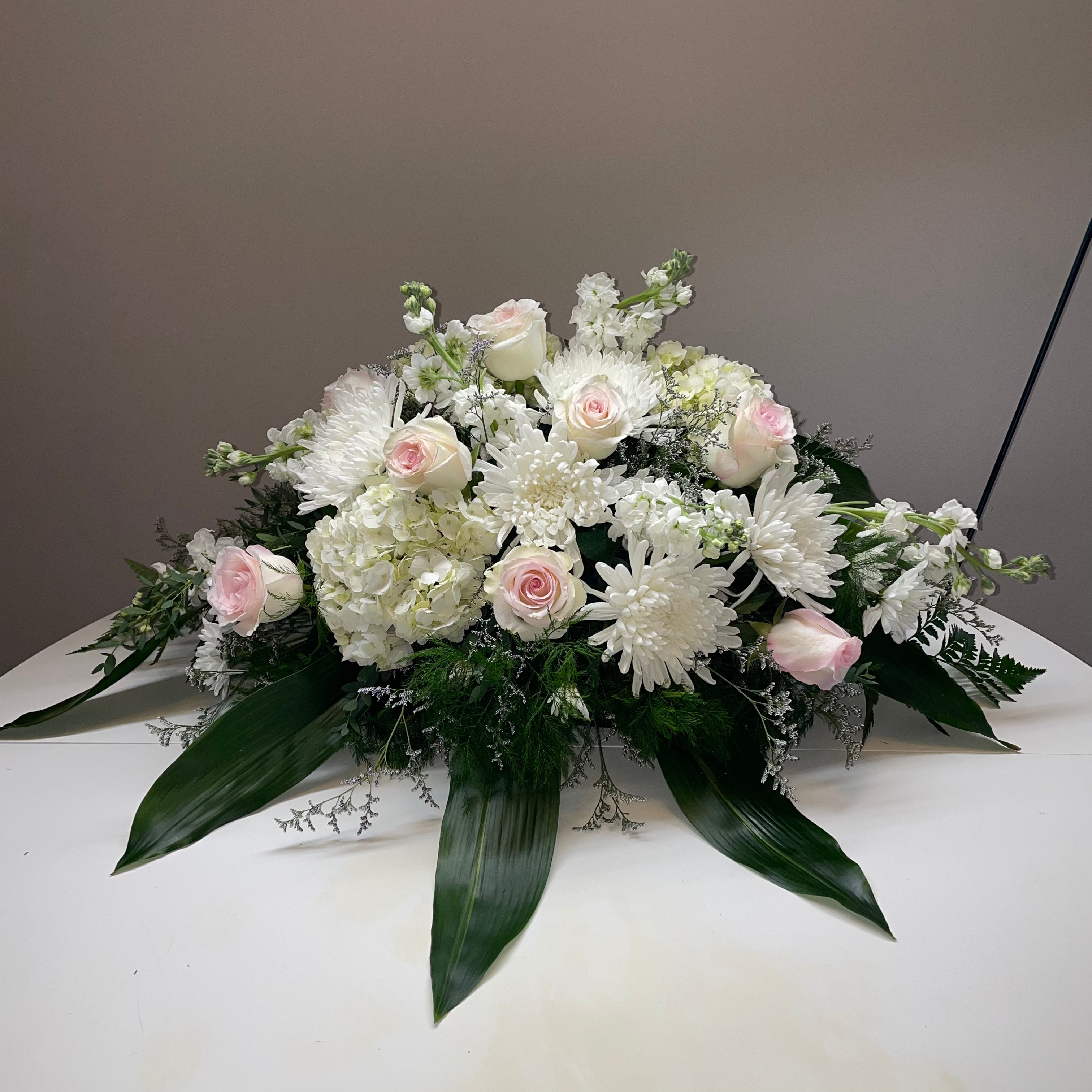 Bouquet Casket Spray: roses and orchids